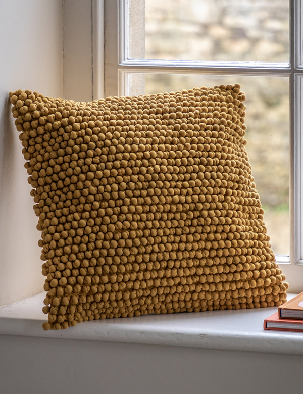 Tan Bobble Cushion
