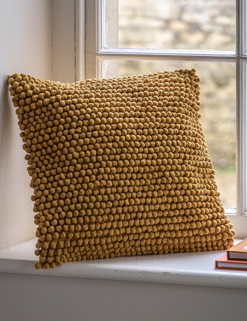 Tan Bobble Cushion